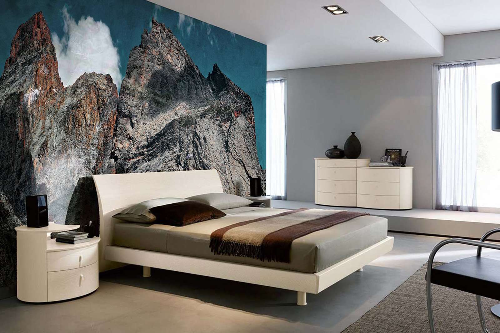 Camera da letto con foto rocce su parete